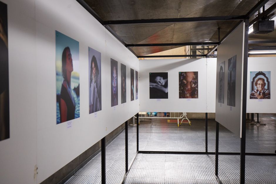 Experience a modern art exhibition showcasing diverse photography styles in an urban museum.